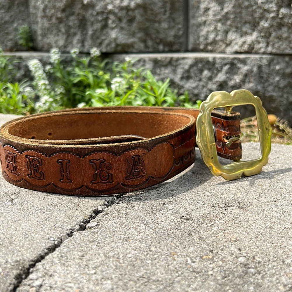 Retro Western style name belt. Brown leather with brass buckle.